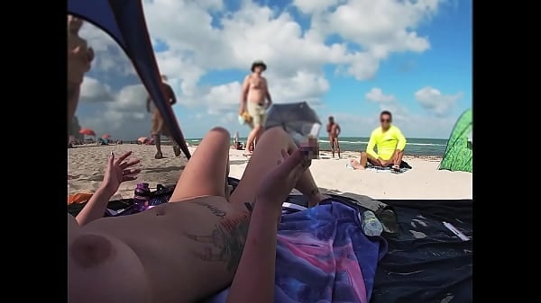 Nude Beach Voyeur Strokes His Cock While Perverts Watch Her